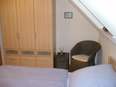 Ein Bett oder Betten in einem Zimmer der Unterkunft Haus Kollwitzweg - Ferienwohnungen