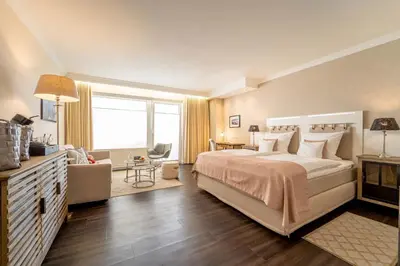 Ein Bett oder Betten in einem Zimmer der Unterkunft Romantischer Winkel RoLigio & Wellness Resort