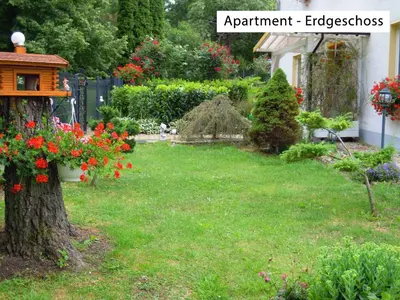 Ein Garten an der Unterkunft Ferienwohnung Wolfsholz