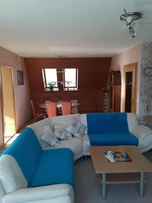 Ein Sitzbereich in der Unterkunft Ferienhaus Pieper