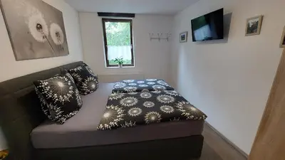 Ein Bett oder Betten in einem Zimmer der Unterkunft Kaiserpfalzquartier