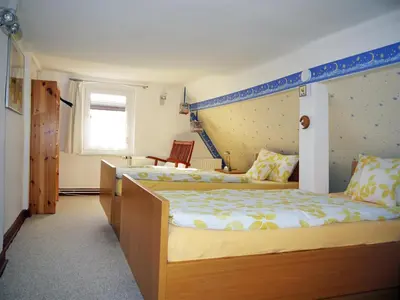 Ein Bett oder Betten in einem Zimmer der Unterkunft Ferienhaus Oliv