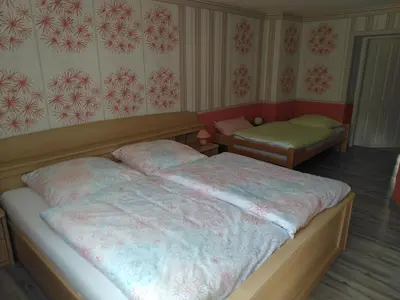 Ein Bett oder Betten in einem Zimmer der Unterkunft Urlaub im Fachwerkhaus