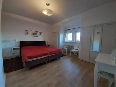 Ein Bett oder Betten in einem Zimmer der Unterkunft Ferienwohnung Stricker Typ E