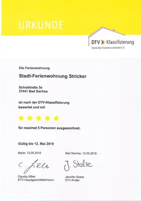 Ein Zertifikat, Auszeichnung, Logo oder anderes Dokument, das in der Unterkunft Ferienwohnung Stricker Typ E ausgestellt ist