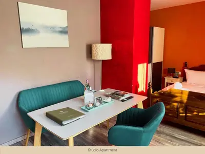 Ein Sitzbereich in der Unterkunft Trattoria & Apartments - Casa da Enzo