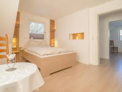 Ein Bett oder Betten in einem Zimmer der Unterkunft Ferienhaus Gretel in Zorge