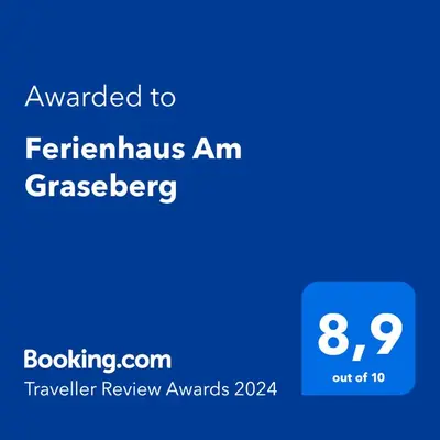 Ein Zertifikat, Auszeichnung, Logo oder anderes Dokument, das in der Unterkunft Ferienhaus Am Graseberg ausgestellt ist