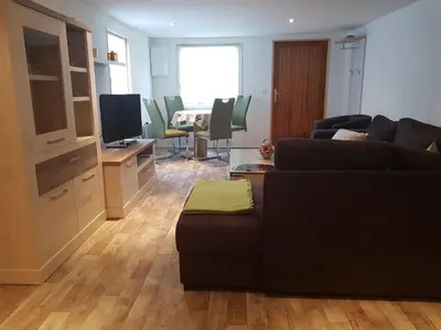 Ein Sitzbereich in der Unterkunft Ferienhaus Am Graseberg