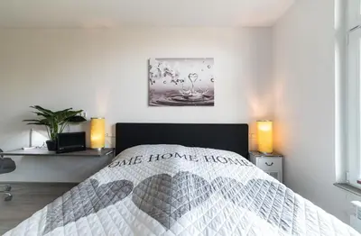Ein Bett oder Betten in einem Zimmer der Unterkunft mountain-view-apartments de