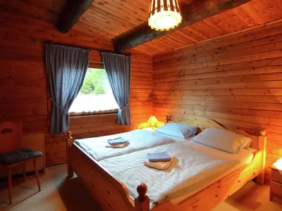 Ein Bett oder Betten in einem Zimmer der Unterkunft Ferienwohnung in Kamschlacken