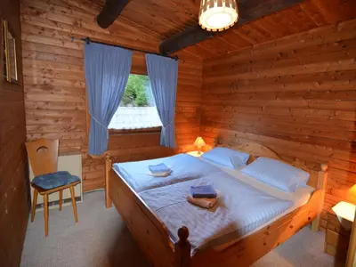 Ein Bett oder Betten in einem Zimmer der Unterkunft Ferienwohnung in Kamschlacken