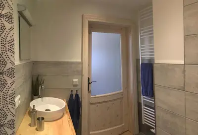 Ein Badezimmer in der Unterkunft Ferienwohnungen an der Blasiikirche