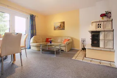 Ein Sitzbereich in der Unterkunft Ferienhaus im Harz mit Wanderwegen