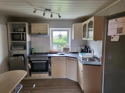 Küche/Küchenzeile in der Unterkunft Ferienwohnung in den Hüttenroder Bergen