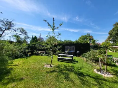 Ein Garten an der Unterkunft Ferienwohnung in den Hüttenroder Bergen
