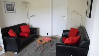 Ein Sitzbereich in der Unterkunft Glockenturmblick Finke