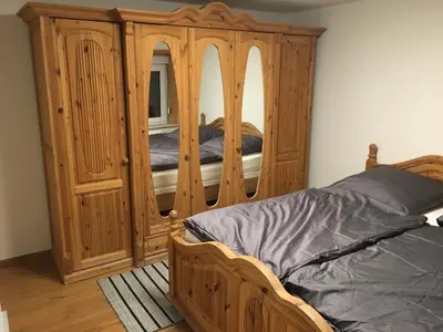 Ein Bett oder Betten in einem Zimmer der Unterkunft Glockenturmblick Finke