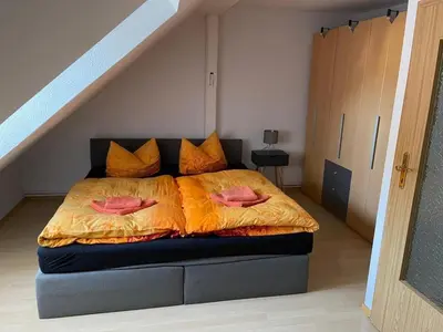 Ein Bett oder Betten in einem Zimmer der Unterkunft Ferienwohnung Kreft