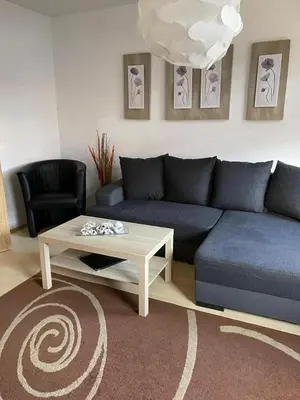 Ein Sitzbereich in der Unterkunft Ferienwohnung Kreft