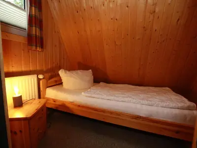 Ein Bett oder Betten in einem Zimmer der Unterkunft Ferienhaus in Clausthal-Zellerfeld mit Terrasse