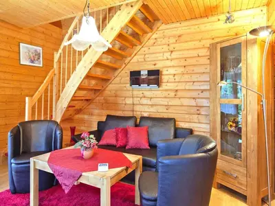 Ein Sitzbereich in der Unterkunft Holiday home in Hasselfelde