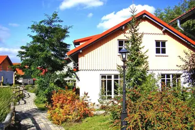 Ein Garten an der Unterkunft Ferienhaus in Wernigerode mit Innenpool