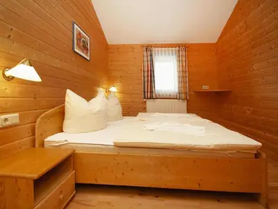 Ein Bett oder Betten in einem Zimmer der Unterkunft Ferienpark Harz in Hasselfelde