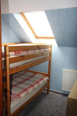 Ein Bett oder Betten in einem Zimmer der Unterkunft Ferienwohnung Werner