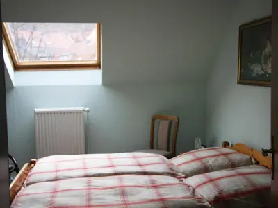 Ein Bett oder Betten in einem Zimmer der Unterkunft Ferienwohnung Werner