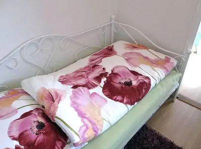 Ein Bett oder Betten in einem Zimmer der Unterkunft Ferienwohnung Himmelblau - Altenau Harz