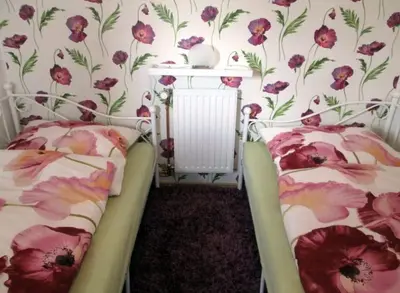 Ein Bett oder Betten in einem Zimmer der Unterkunft Ferienwohnung Himmelblau - Altenau Harz