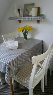 Ein Sitzbereich in der Unterkunft Ferienwohnungen Haus am Karpfenteich