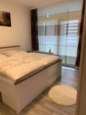 Ein Bett oder Betten in einem Zimmer der Unterkunft Mariposa inclusive Pool und Sauna