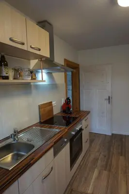 Küche/Küchenzeile in der Unterkunft Ferienhaus Hundertmorgenfeld 33