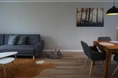 Ein Sitzbereich in der Unterkunft Ferienhaus Hundertmorgenfeld 33