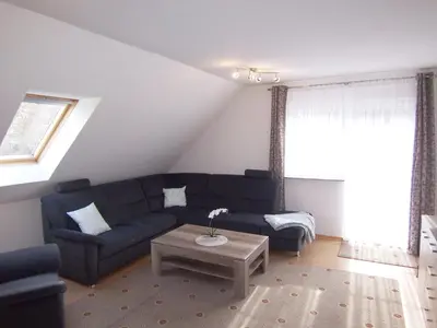 Ein Sitzbereich in der Unterkunft Ferienwohnung Vier Sterne