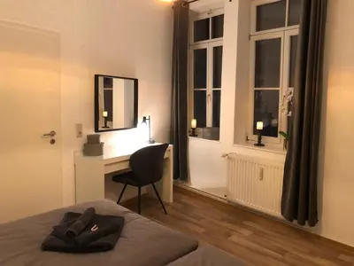 Ein Bett oder Betten in einem Zimmer der Unterkunft Ferienwohnung am Schlosspfad No. 2