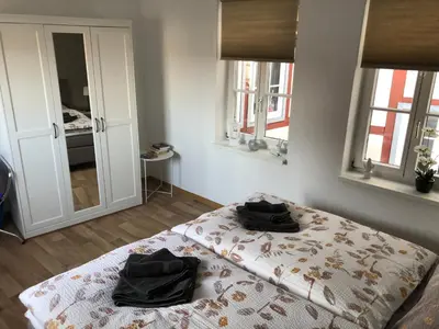 Ein Bett oder Betten in einem Zimmer der Unterkunft Ferienwohnung am Schlosspfad No. 2