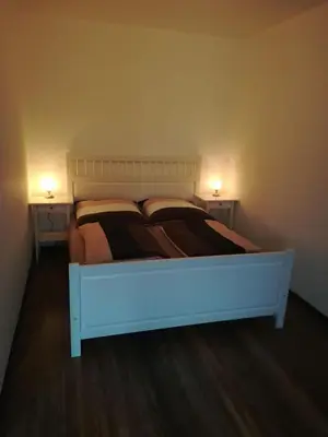 Ein Bett oder Betten in einem Zimmer der Unterkunft Ferienwohnung Brocken