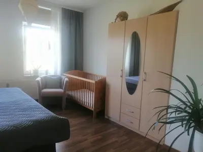 Ein Bett oder Betten in einem Zimmer der Unterkunft Ferienwohnung HARZgeNUSS