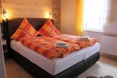 Ein Bett oder Betten in einem Zimmer der Unterkunft Ferienwohnung Maja