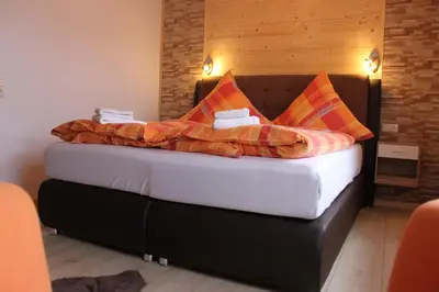 Ein Bett oder Betten in einem Zimmer der Unterkunft Ferienwohnung Maja