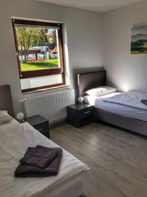 Ein Bett oder Betten in einem Zimmer der Unterkunft Freizeitcenter Bad Sachsa