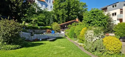Ein Garten an der Unterkunft Pension Böttger