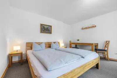 Ein Bett oder Betten in einem Zimmer der Unterkunft Pension Böttger