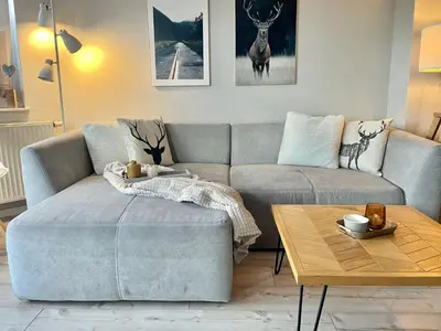 Ein Sitzbereich in der Unterkunft GUGLHUPF Wohlfühl-Maisonette mit Boxspring, NETFLIX, Fahrstuhl