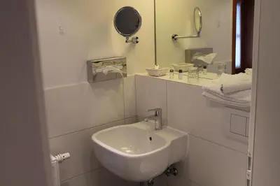Ein Badezimmer in der Unterkunft Fürstenhof Wernigerode Garni