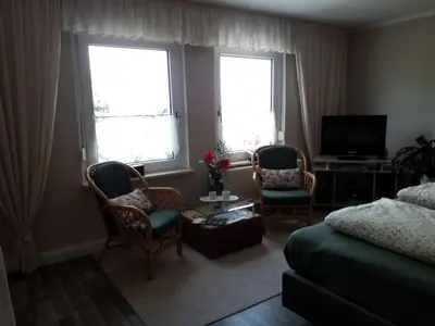 Ein Sitzbereich in der Unterkunft Ferienwohnung Quedlinburg OT Gernrode Harz