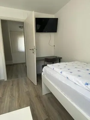 Ein Bett oder Betten in einem Zimmer der Unterkunft Hotel Braunlage